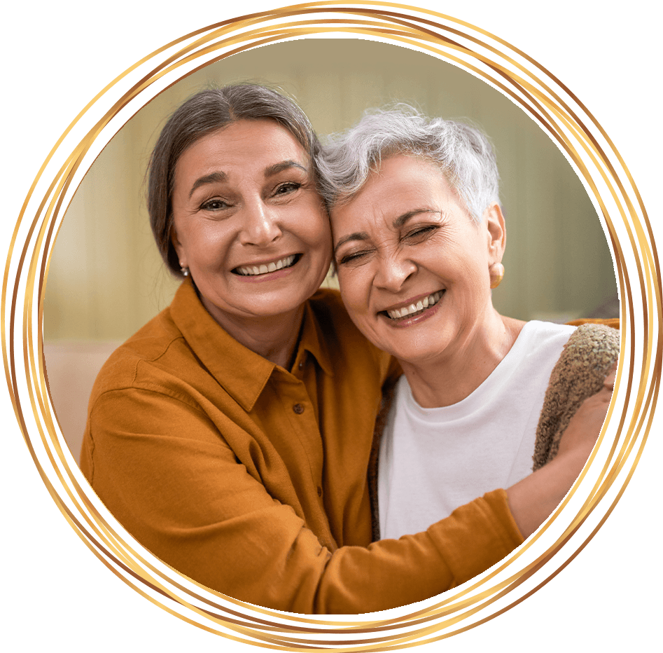 older women smiling and hugging